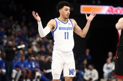 Dec 30, 2023; Memphis, Tennessee, USA; Memphis Tigers guard Jahvon Quinerly (11) reacts during the second half against the Austin Peay Governors at FedExForum. Mandatory Credit: Petre Thomas-USA TODAY Sports