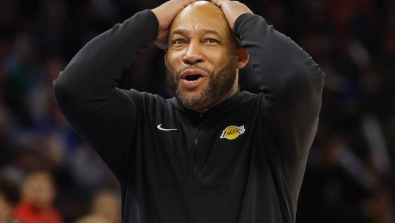 Dec 30, 2023; Minneapolis, Minnesota, USA; Los Angeles Lakers head coach Darvin Ham reacts to call by a referee for the Minnesota Timberwolves in the third quarter at Target Center. Mandatory Credit: Bruce Kluckhohn-USA TODAY Sports