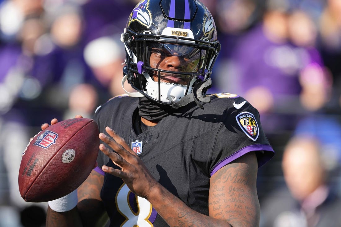 Dec 31, 2023; Baltimore, Maryland, USA; Baltimore Ravens  quarterback Lamar Jackson (8) warms up prior to the game against the Miami Dolphins at M&T Bank Stadium. Mandatory Credit: Mitch Stringer-USA TODAY Sports