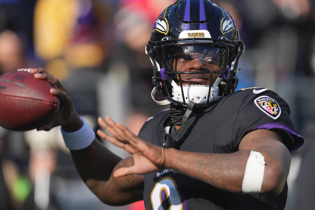 Dec 31, 2023; Baltimore, Maryland, USA; Baltimore Ravens  quarterback Lamar Jackson (8) warms up prior to the game against the Miami Dolphins at M&T Bank Stadium. Mandatory Credit: Mitch Stringer-USA TODAY Sports