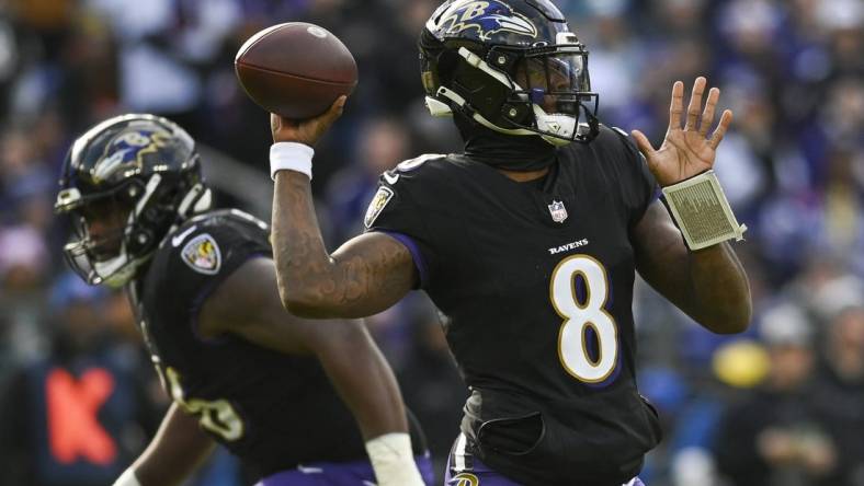 Dec 31, 2023; Baltimore, Maryland, USA; Baltimore Ravens quarterback Lamar Jackson (8) throws during the  during the first quarter against the Miami Dolphins at M&T Bank Stadium. Mandatory Credit: Tommy Gilligan-USA TODAY Sports