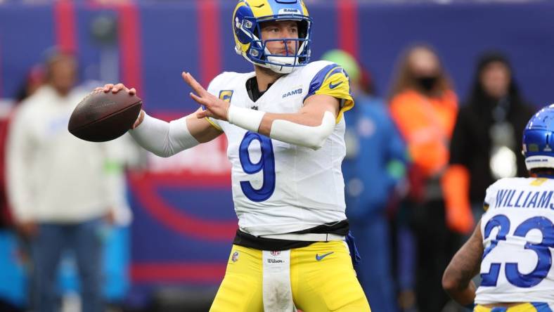 Dec 31, 2023; East Rutherford, New Jersey, USA; Los Angeles Rams quarterback Matthew Stafford (9) throws the ball during the first half against the New York Giants at MetLife Stadium. Mandatory Credit: Vincent Carchietta-USA TODAY Sports