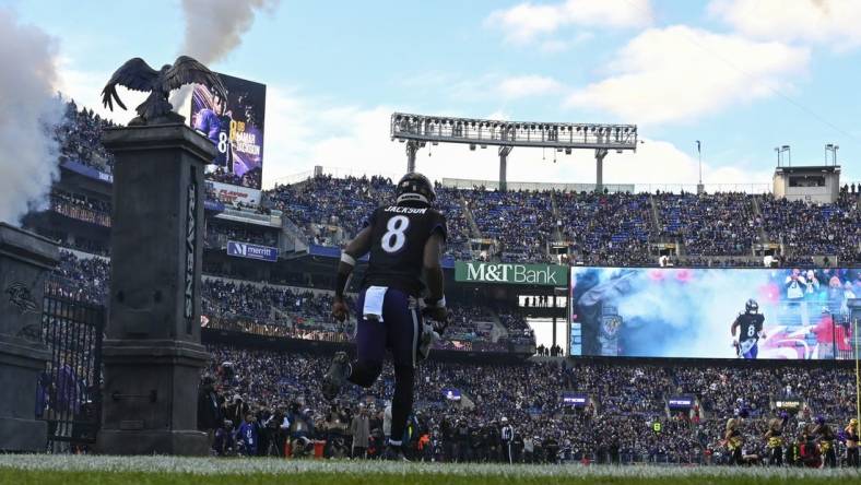 Dec 31, 2023; Baltimore, Maryland, USA;  Baltimore Ravens quarterback Lamar Jackson (8) enters the field before the game against the Miami Dolphins at M&T Bank Stadium. Mandatory Credit: Tommy Gilligan-USA TODAY Sports