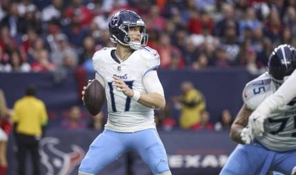 Dec 31, 2023; Houston, Texas, USA; Tennessee Titans quarterback Ryan Tannehill (17) looks for an open receiver during the fourth quarter against the Houston Texans at NRG Stadium. Mandatory Credit: Troy Taormina-USA TODAY Sports