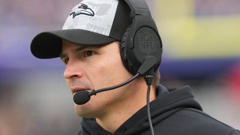 Dec 31, 2023; Baltimore, Maryland, USA; Baltimore Ravens  defensive coordinator Mike Macdonald on the sidelines during the third quarter against the Miami Dolphins at M&T Bank Stadium. Mandatory Credit: Mitch Stringer-USA TODAY Sports