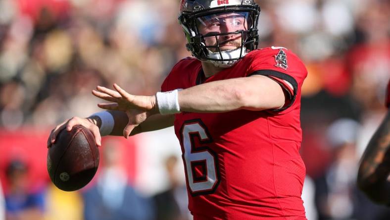 Dec 31, 2023; Tampa, Florida, USA;  Tampa Bay Buccaneers quarterback Baker Mayfield (6) drops back to pass against the New Orleans Saints in the fourth quarter at Raymond James Stadium. Mandatory Credit: Nathan Ray Seebeck-USA TODAY Sports