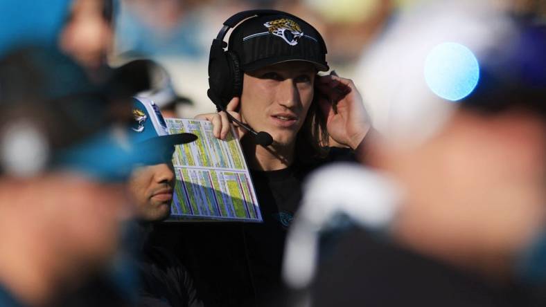 Jacksonville Jaguars quarterback Trevor Lawrence (16) looks on from the sideline during the fourth quarter of a regular season NFL football matchup Sunday, Dec. 31, 2023 at EverBank Stadium in Jacksonville, Fla. The Jacksonville Jaguars blanked the Carolina Panthers 26-0. [Corey Perrine/Florida Times-Union]