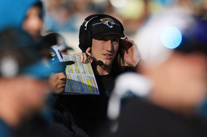 Jacksonville Jaguars quarterback Trevor Lawrence (16) looks on from the sideline during the fourth quarter of a regular season NFL football matchup Sunday, Dec. 31, 2023 at EverBank Stadium in Jacksonville, Fla. The Jacksonville Jaguars blanked the Carolina Panthers 26-0. [Corey Perrine/Florida Times-Union]