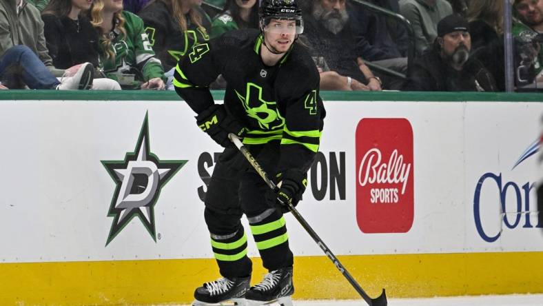 Dec 31, 2023; Dallas, Texas, USA; Dallas Stars defenseman Miro Heiskanen (4) skates against the Chicago Blackhawks during the second period at the American Airlines Center. Mandatory Credit: Jerome Miron-USA TODAY Sports