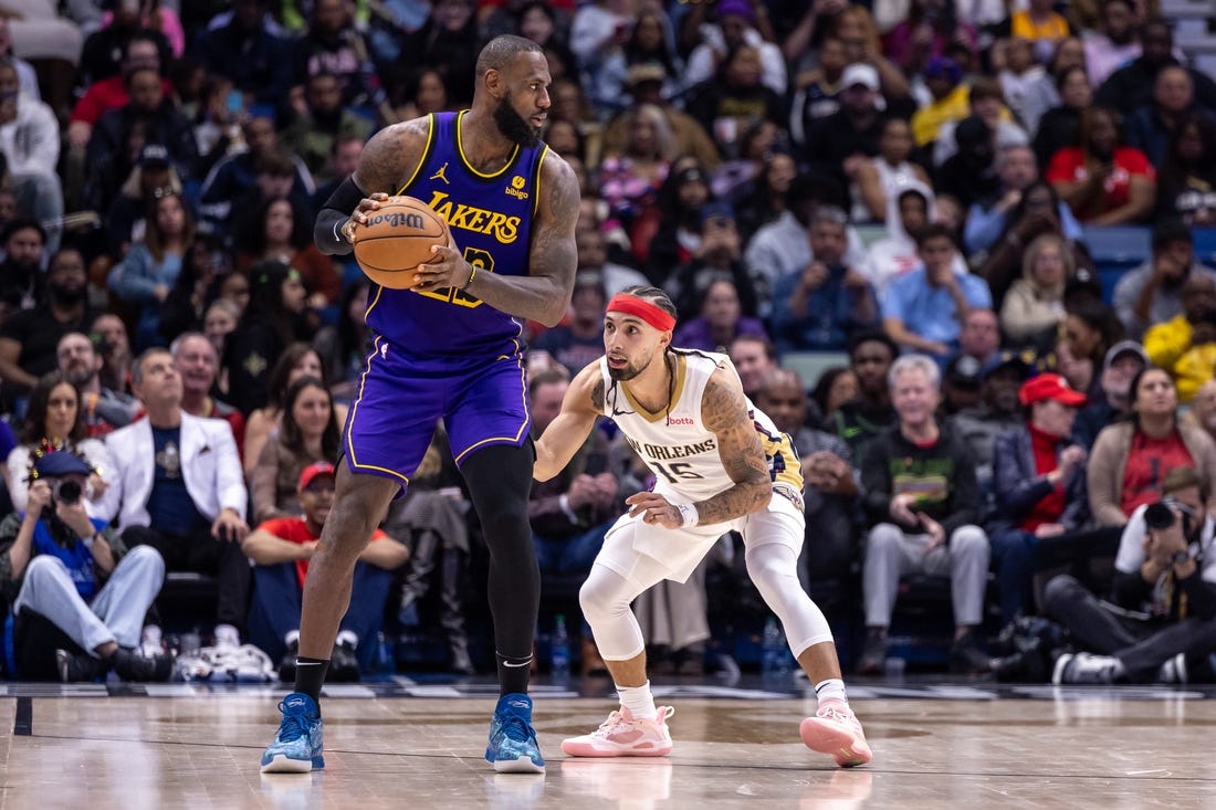 Dec 31, 2023; New Orleans, Louisiana, USA;  New Orleans Pelicans guard Jose Alvarado (15) guards Los Angeles Lakers forward LeBron James (23) during the second half at Smoothie King Center. Mandatory Credit: Stephen Lew-USA TODAY Sports