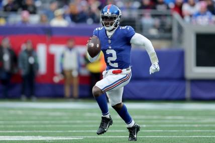 Dec 31, 2023; East Rutherford, New Jersey, USA; New York Giants quarterback Tyrod Taylor (2) runs with the ball against the Los Angeles Rams during the third quarter at MetLife Stadium. Mandatory Credit: Brad Penner-USA TODAY Sports