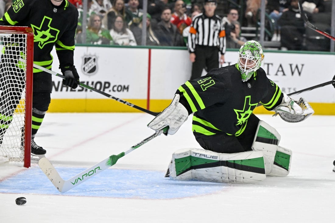 Dec 31, 2023; Dallas, Texas, USA; Dallas Stars goaltender Scott Wedgewood (41) makes a stick save against the Chicago Blackhawks during the third period at the American Airlines Center. Mandatory Credit: Jerome Miron-USA TODAY Sports