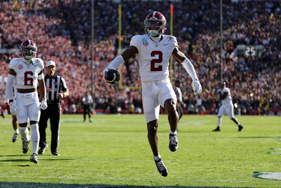 Jan 1, 2024; Pasadena, CA, USA; Alabama Crimson Tide defensive back Caleb Downs (2) celebrates after making a catch in the first quarter against the Michigan Wolverines in the 2024 Rose Bowl college football playoff semifinal game at Rose Bowl. Mandatory Credit: Kiyoshi Mio-USA TODAY Sports