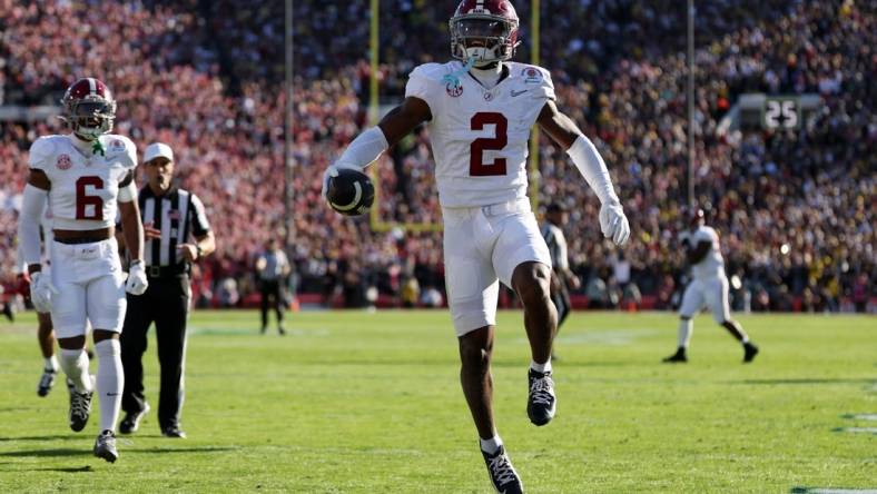 Jan 1, 2024; Pasadena, CA, USA; Alabama Crimson Tide defensive back Caleb Downs (2) celebrates after making a catch in the first quarter against the Michigan Wolverines in the 2024 Rose Bowl college football playoff semifinal game at Rose Bowl. Mandatory Credit: Kiyoshi Mio-USA TODAY Sports