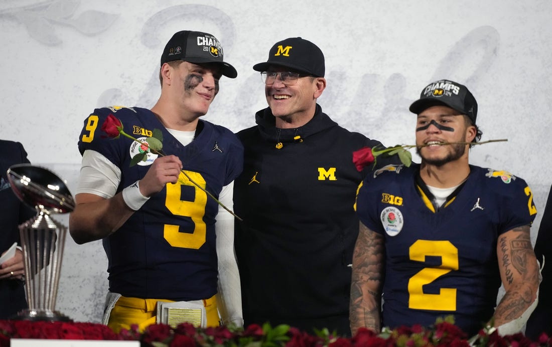 Jan 1, 2024; Pasadena, CA, USA; Michigan Wolverines head coach Jim Harbaugh (center) celebrates with quarterback J.J. McCarthy (9) and running back Blake Corum (2) after defeating the Alabama Crimson Tide in the 2024 Rose Bowl college football playoff semifinal game at Rose Bowl. Mandatory Credit: Kirby Lee-USA TODAY Sports