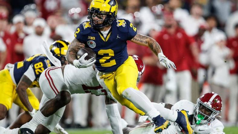 Michigan running back Blake Corum (2) runs against Alabama during the second half of the Rose Bowl in Pasadena, Calif., on Monday, Jan. 1, 2024.