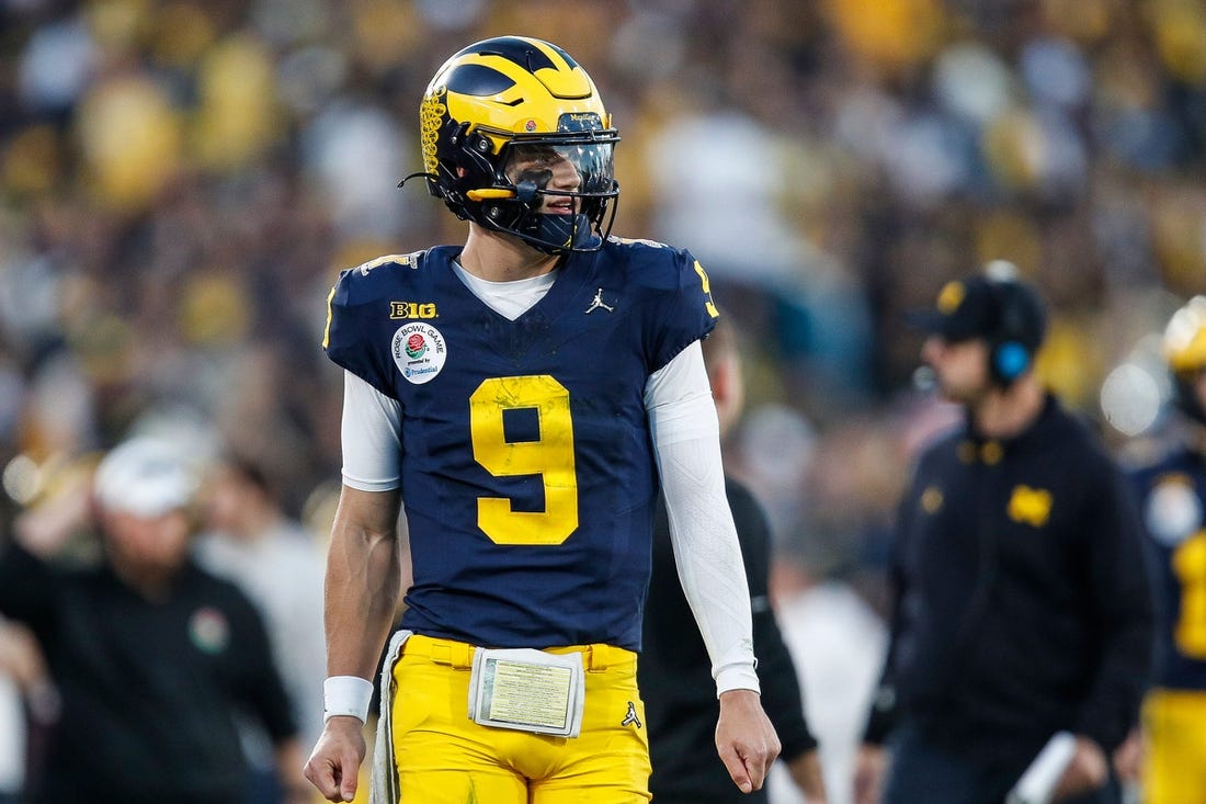 Michigan quarterback J.J. McCarthy (9) watches a play from the sideline during the second half of the Rose Bowl in Pasadena, Calif., on Monday, Jan. 1, 2024.