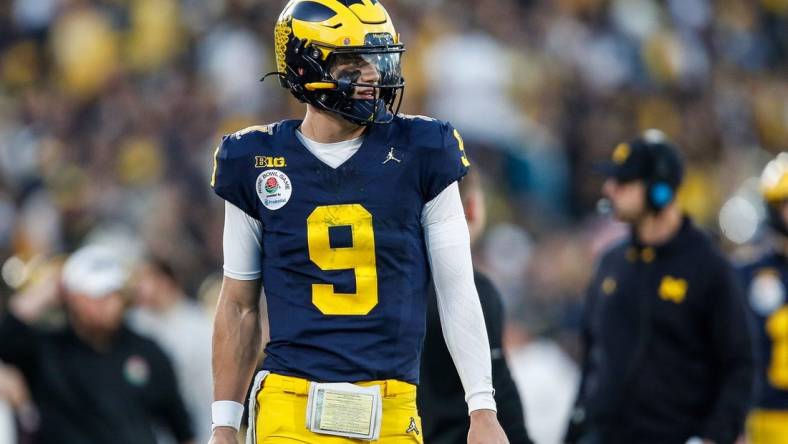 Michigan quarterback J.J. McCarthy (9) watches a play from the sideline during the second half of the Rose Bowl in Pasadena, Calif., on Monday, Jan. 1, 2024.