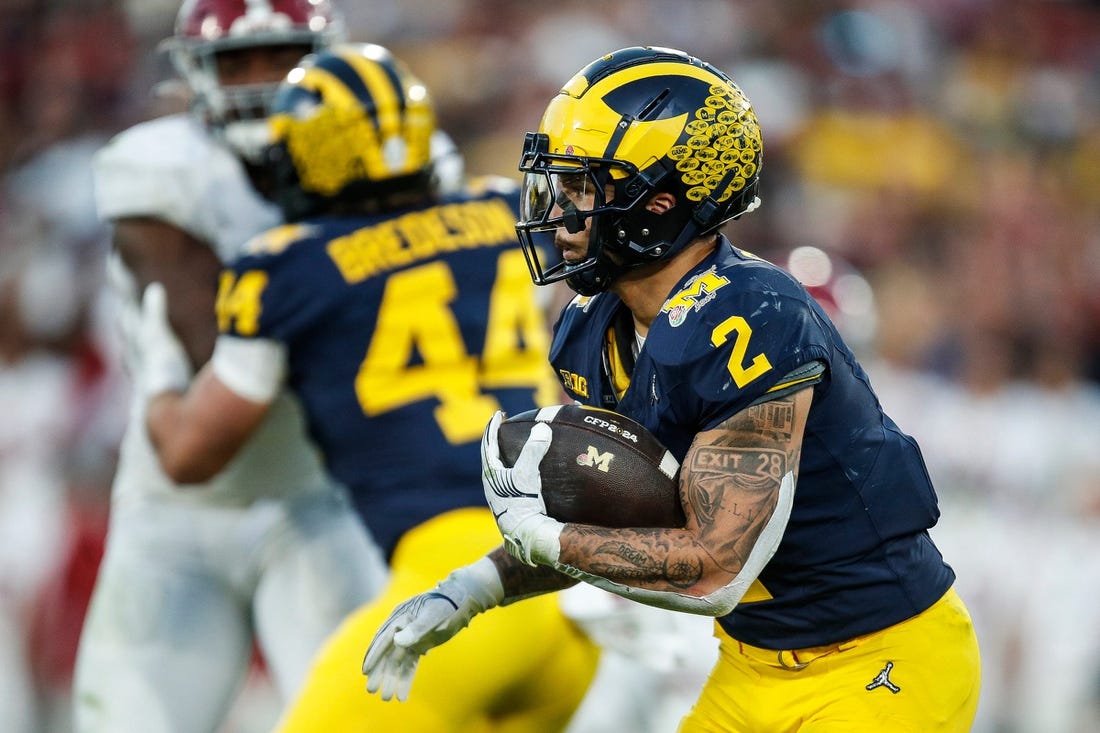 Michigan running back Blake Corum (2) runs against Alabama during the second half of the Rose Bowl in Pasadena, Calif., on Monday, Jan. 1, 2024.