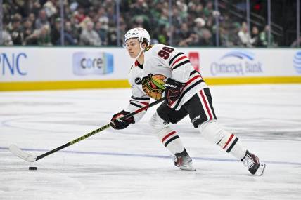 Dec 31, 2023; Dallas, Texas, USA; Chicago Blackhawks center Connor Bedard (98) in action during the game between the Dallas Stars and the Chicago Blackhawks at the American Airlines Center. Mandatory Credit: Jerome Miron-USA TODAY Sports