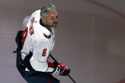 Jan 2, 2024; Pittsburgh, Pennsylvania, USA;  Washington Capitals left wing Alex Ovechkin (8) takes the ice to warm up before the game against the Pittsburgh Penguins at PPG Paints Arena. Mandatory Credit: Charles LeClaire-USA TODAY Sports