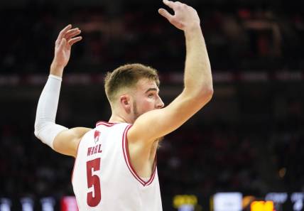 Jan 2, 2024; Madison, Wisconsin, USA;  Wisconsin Badgers forward Tyler Wahl (5) motions to the crowd during the first half against the Iowa Hawkeyes at the Kohl Center. Mandatory Credit: Kayla Wolf-USA TODAY Sports