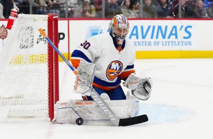 Jan 2, 2024; Denver, Colorado, USA; New York Islanders goaltender Ilya Sorokin (30) makes a pad save in the second period against the Colorado Avalanche at Ball Arena. Mandatory Credit: Ron Chenoy-USA TODAY Sports