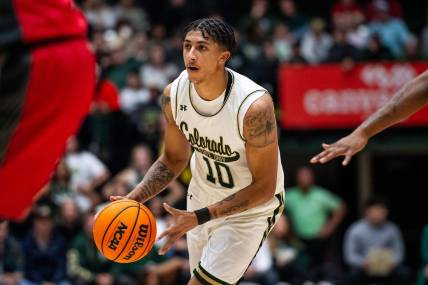 Colorado State's Nique Clifford comes up with the ball during a game against University of New Mexico at Moby Arena in Fort Collins, Colo., on Tuesday, Jan. 2, 2024.
