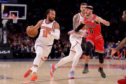 Jan 3, 2024; New York, New York, USA; New York Knicks guard Jalen Brunson (11) drives to the basket against Chicago Bulls guard Alex Caruso (6) during the first quarter at Madison Square Garden. Mandatory Credit: Brad Penner-USA TODAY Sports