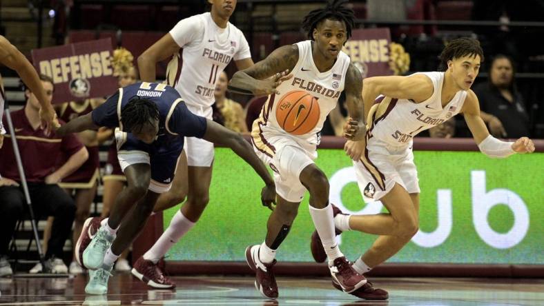 Jan 3, 2024; Tallahassee, Florida, USA; Florida State Seminoles forward Jamir Watkins (2) moves the ball up the court after a defensive stand against the Georgia Tech Yellow Jackets at Donald L. Tucker Center. Mandatory Credit: Melina Myers-USA TODAY Sports