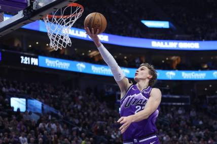 Jan 3, 2024; Salt Lake City, Utah, USA; Utah Jazz forward Lauri Markkanen (23) lays the ball up against the Detroit Pistons during the first quarter at Delta Center. Mandatory Credit: Rob Gray-USA TODAY Sports