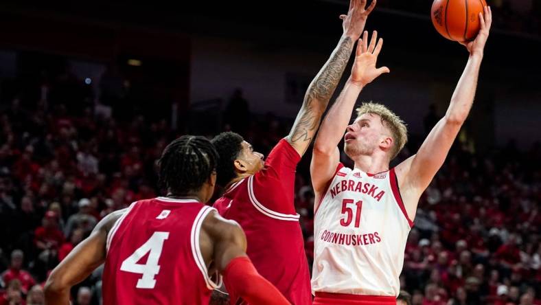 Jan 3, 2024; Lincoln, Nebraska, USA; Nebraska Cornhuskers forward Rienk Mast (51) shoots the ball against Indiana Hoosiers center Kel'el Ware (1) and forward Anthony Walker (4) during the first half at Pinnacle Bank Arena. Mandatory Credit: Dylan Widger-USA TODAY Sports