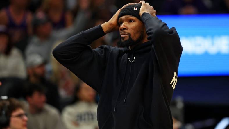 Jan 3, 2024; Phoenix, Arizona, USA; Phoenix Suns forward Kevin Durant (35) reacts from the bench during the fourth quarter of the game against the LA Clippers at Footprint Center. Mandatory Credit: Mark J. Rebilas-USA TODAY Sports