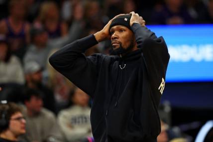 Jan 3, 2024; Phoenix, Arizona, USA; Phoenix Suns forward Kevin Durant (35) reacts from the bench during the fourth quarter of the game against the LA Clippers at Footprint Center. Mandatory Credit: Mark J. Rebilas-USA TODAY Sports