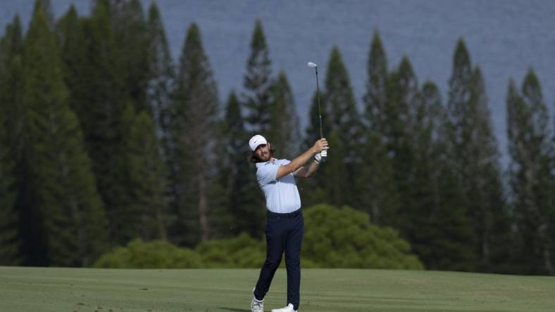 January 4, 2024; Maui, Hawaii, USA; Tommy Fleetwood hits his fairway shot on the fourth hole during the first round of The Sentry Tournament of Champions golf tournament at Kapalua Golf - The Plantation Course. Mandatory Credit: Kyle Terada-USA TODAY Sports