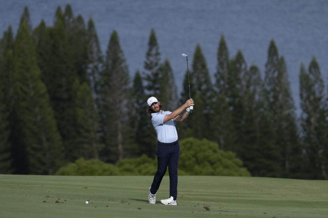 January 4, 2024; Maui, Hawaii, USA; Tommy Fleetwood hits his fairway shot on the fourth hole during the first round of The Sentry Tournament of Champions golf tournament at Kapalua Golf - The Plantation Course. Mandatory Credit: Kyle Terada-USA TODAY Sports