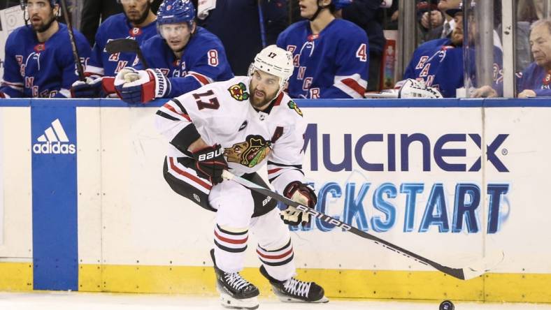 Jan 4, 2024; New York, New York, USA; Chicago Blackhawks left wing Nick Foligno (17) controls the puck in the third period against the New York Rangers at Madison Square Garden. Mandatory Credit: Wendell Cruz-USA TODAY Sports