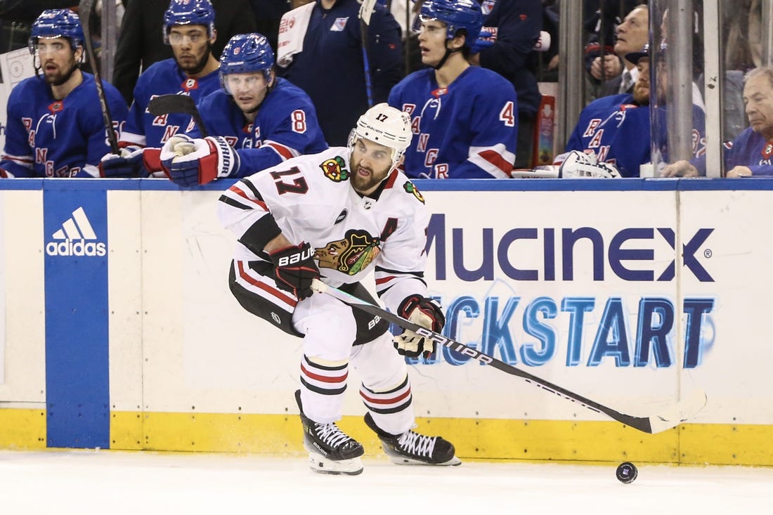 Jan 4, 2024; New York, New York, USA; Chicago Blackhawks left wing Nick Foligno (17) controls the puck in the third period against the New York Rangers at Madison Square Garden. Mandatory Credit: Wendell Cruz-USA TODAY Sports