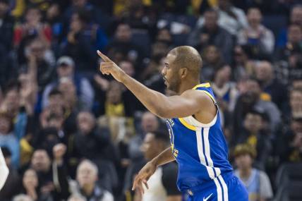 Jan 4, 2024; San Francisco, California, USA; Golden State Warriors guard Chris Paul (3) reacts after hitting a three-point shot against the Denver Nuggets during the first half at Chase Center. Mandatory Credit: John Hefti-USA TODAY Sports