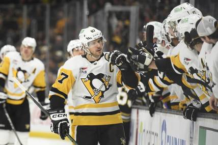 Jan 4, 2024; Boston, Massachusetts, USA; Pittsburgh Penguins center Sidney Crosby (87) celebrates his goal with his teammates during the third period against the Boston Bruins at TD Garden. Mandatory Credit: Bob DeChiara-USA TODAY Sports