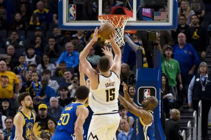 Jan 4, 2024; San Francisco, California, USA; Denver Nuggets center Nikola Jokic (15) hits a shot against the Golden State Warriors late in the second half at Chase Center. Mandatory Credit: John Hefti-USA TODAY Sports