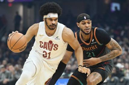 Jan 5, 2024; Cleveland, Ohio, USA; Cleveland Cavaliers center Jarrett Allen (31) drives to the basket against Washington Wizards center Daniel Gafford (21) during the first half at Rocket Mortgage FieldHouse. Mandatory Credit: Ken Blaze-USA TODAY Sports
