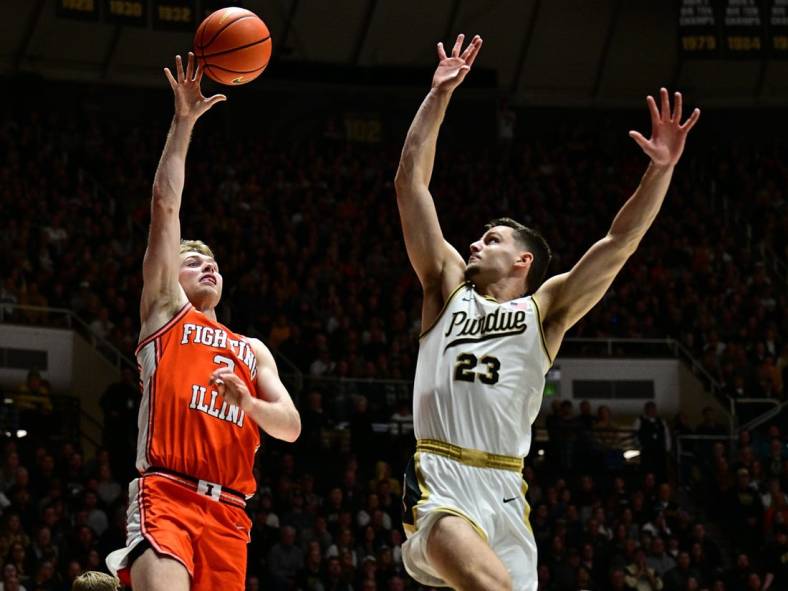 Jan 5, 2024; West Lafayette, Indiana, USA; Illinois Fighting Illini forward Marcus Domask (3) shoots the ball over Purdue Boilermakers forward Camden Heide (23) during the first half at Mackey Arena. Mandatory Credit: Marc Lebryk-USA TODAY Sports