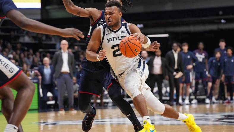 Butler Bulldogs guard Pierre Brooks (21) rushes up the court Friday, Jan. 5, 2024, during the game at Hinkle Fieldhouse in Indianapolis. Butler Bulldogs lost to the Connecticut Huskies, 88-81.