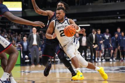 Butler Bulldogs guard Pierre Brooks (21) rushes up the court Friday, Jan. 5, 2024, during the game at Hinkle Fieldhouse in Indianapolis. Butler Bulldogs lost to the Connecticut Huskies, 88-81.
