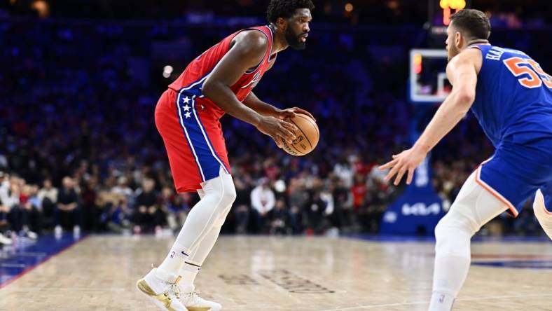 Jan 5, 2024; Philadelphia, Pennsylvania, USA; Philadelphia 76ers center Joel Embiid (21) controls the ball against the New York Knicks in the third quarter at Wells Fargo Center. Mandatory Credit: Kyle Ross-USA TODAY Sports