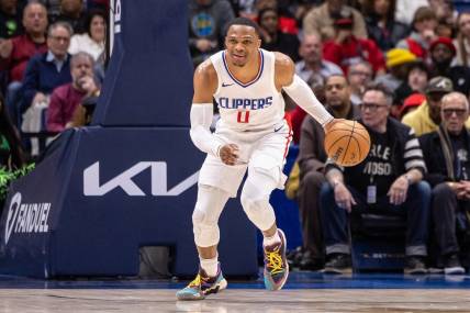Jan 5, 2024; New Orleans, Louisiana, USA;  LA Clippers guard Russell Westbrook (0) brings the ball up court against the New Orleans Pelicans during the second half at Smoothie King Center. Mandatory Credit: Stephen Lew-USA TODAY Sports