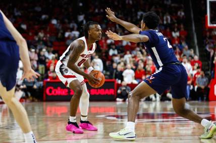 Jan 6, 2024; Raleigh, North Carolina, USA;  North Carolina State Wolfpack guard DJ Horne (0) with the ball during the first half against Virginia Cavaliers at PNC Arena. Mandatory Credit: Jaylynn Nash-USA TODAY Sports