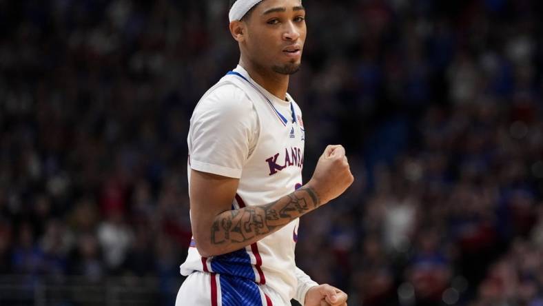 Jan 6, 2024; Lawrence, Kansas, USA; Kansas Jayhawks guard Dajuan Harris Jr. (3) celebrates after scoring late in the second half against the TCU Horned Frogs at Allen Fieldhouse. Mandatory Credit: Jay Biggerstaff-USA TODAY Sports