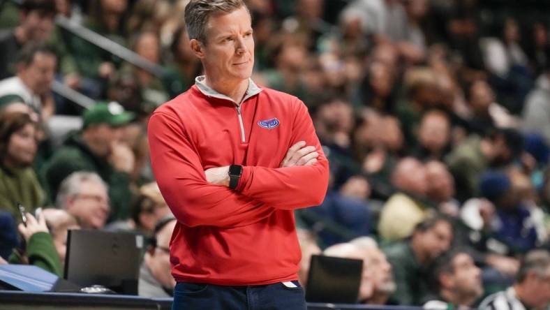 Jan 6, 2024; Charlotte, North Carolina, USA; Florida Atlantic Owls head coach Dusty May reacts to a call during the second half against the Charlotte 49ers at Dale F. Halton Arena. Mandatory Credit: Jim Dedmon-USA TODAY Sports